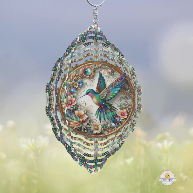 Turquoise hummingbird wind spinner with gold accents and intricate floral details. A stunning outdoor decor piece and meaningful gift for nature lovers or remembrance.
