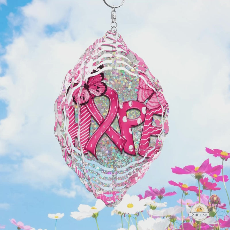 Vibrant pink HOPE wind spinner designed to honor breast cancer awareness and survivors. A beautiful and uplifting garden decor piece symbolizing strength and resilience.
