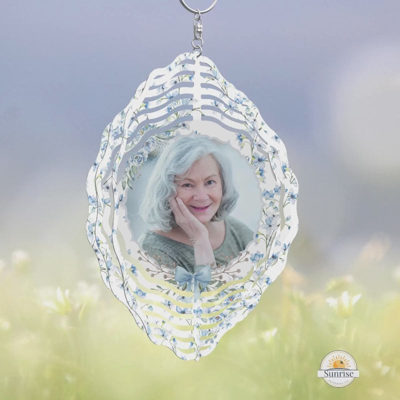 Personalized memorial wind spinner keepsake with blue flowers, custom photo, and poem. Made from durable aluminum for indoor or outdoor garden décor, a thoughtful sympathy gift to honor loved ones.