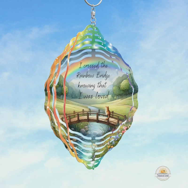 Rainbow Bridge cat wind spinner featuring a heartfelt pet memorial design. A beautiful tribute to a beloved cat, symbolizing love, remembrance, and the bond that lives on.